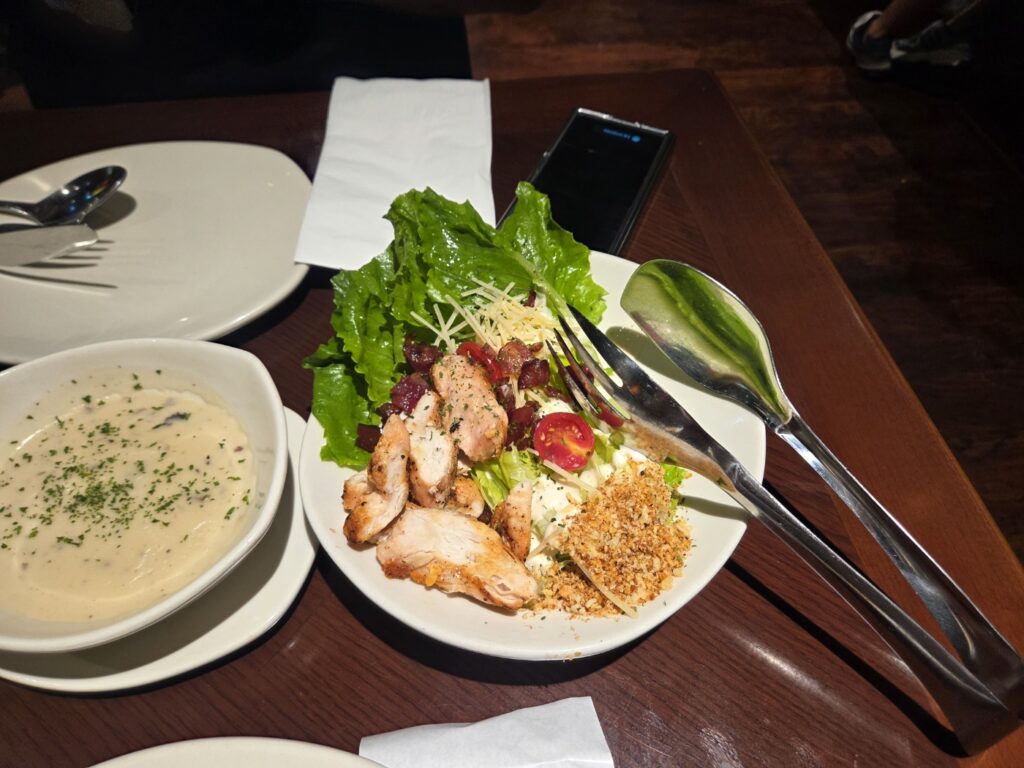 Salad upgraded from soup with fried chicken tender
